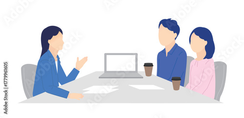 窓口でお客様の接客をするビジネスパーソン