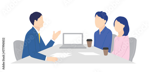 窓口でお客様の接客をするビジネスパーソン