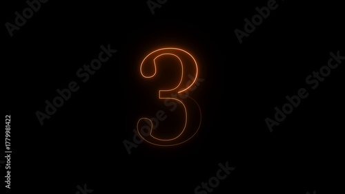 Glowing orange number three illuminated by warm light against a dark black background creating a dramatic and abstract visual