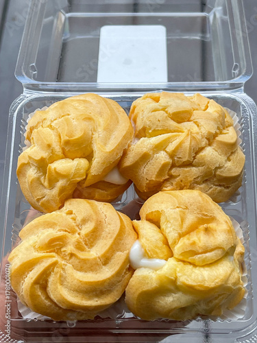 Traditional Eclair style with vanilla cream.