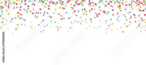 Vibrant, cheerful cascade of multicolored confectionery sprinkles falling playfully on a pristine white background, perfect for joyful celebrations, sweet dessert themes, and festive party designs