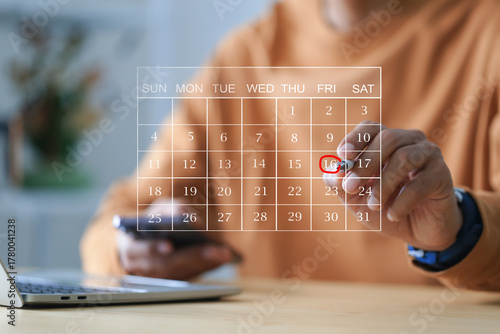 Businessman manages time for effective work. Highlight appointment reminders and meeting agenda on the calendar.
