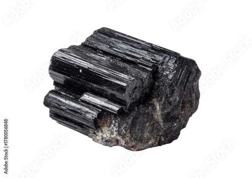 Close-up of a raw black tourmaline crystal specimen with distinct striations on a white background.