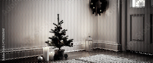 Wrought iron gates and fence with a beautiful Christmas tree decoration for the holiday season card design.