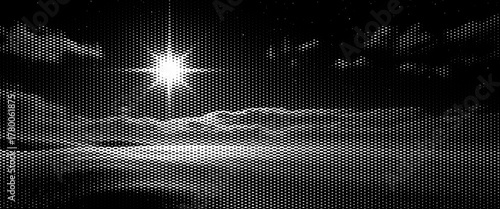 Black and white abstract background with dark night sky and bright moon.