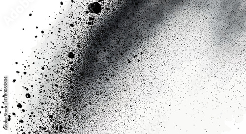 Black ink splatter on white background, creating an abstract texture.