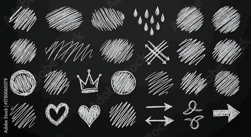 Collection of hand-drawn chalk elements including circles, hearts, arrows, and other shapes on a blackboard.