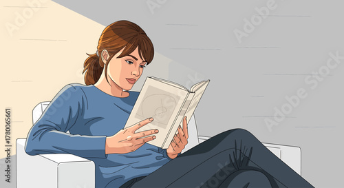 A woman sits in a chair, engrossed in reading a book, relaxed and focused.
