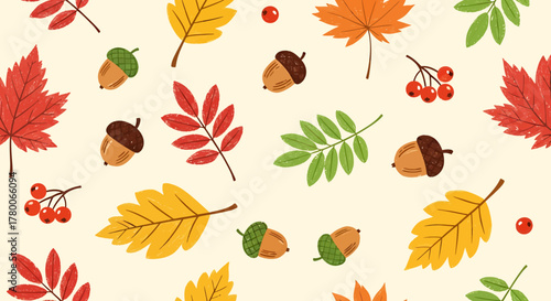 Seamless pattern with colorful autumn leaves, acorns, and rowan berries on a light background.