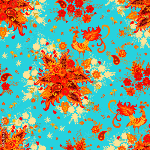 An intricate fairytale pattern with birds, paisley, and flowers in warm orange-red tones on a sky-blue background. Seamless print for fabric, curtains, and bedding. Vector illustration.