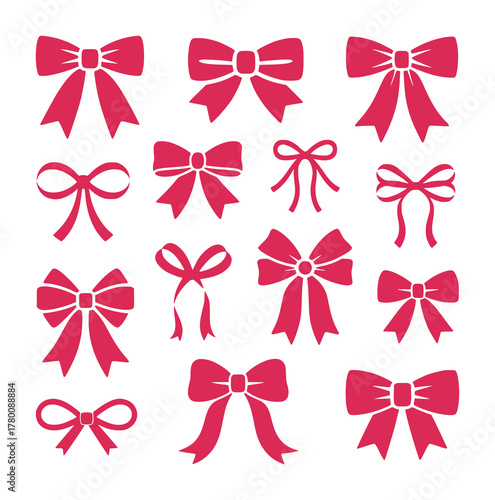 Collection of various pink ribbon bows on a white background