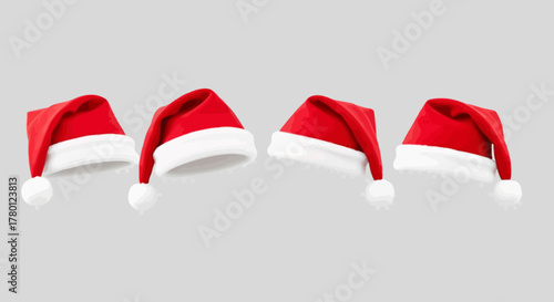 Santa Claus hat set isolated on gray background for Christmas design

