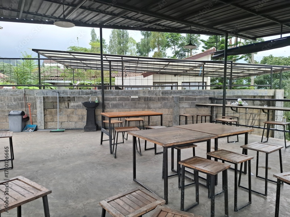 Fototapeta premium Empty Outdoor Canteen with Metal Tables