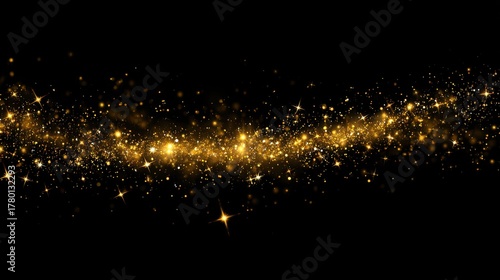 Commercial high-resolution photo of abstract golden glitter particles flowing on a black background.