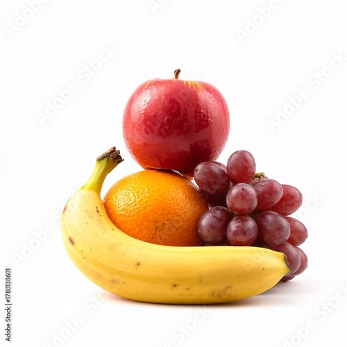 Stack of colorful fresh fruits including apple, orange, banana