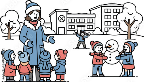 Teacher with children building a snowman and playing in the snow at schoolyard