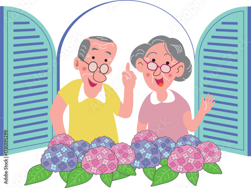 あじさい咲く窓辺の老夫婦
