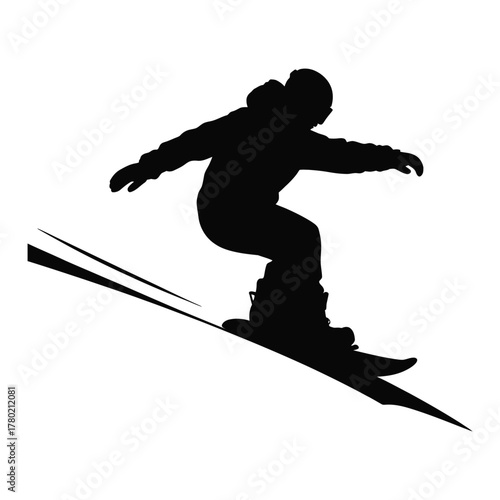 Silhouette of a snowboarder in mid air performing a trick