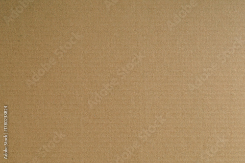 A detailed macro shot of a rich, brown textured surface, showcasing intricate patterns and subtle variations in tone, perfect as a warm, abstract background for design or product placement.