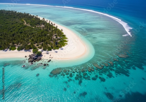 Fototapeta Naklejka Na Ścianę i Meble -  Aerial view of a tropical island with white sand beach and turquoise water in the maldives islands