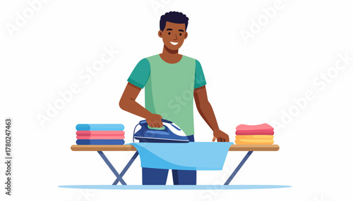 Smiling Black Man Ironing Clothes on a Blue Ironing Board with Stacks.