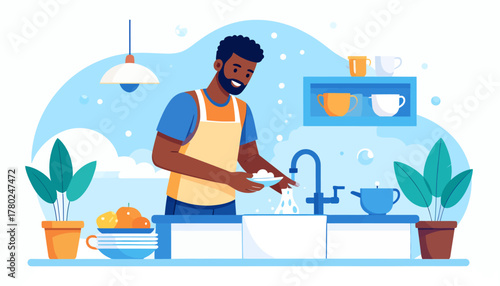 Smiling African American Man Washing Dishes in Kitchen with Apron and Sink.