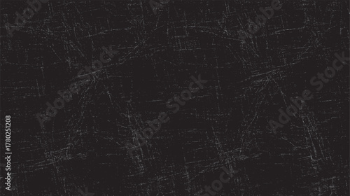 Dark textured background with numerous fine white scratches and distressed marks creating a grunge effect