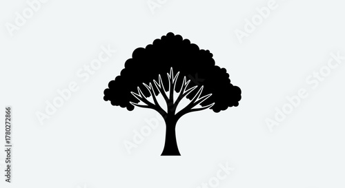 Stylized black silhouette of a mature tree with a dense, leafy canopy and branching structure, perfect for environmental or nature themes
