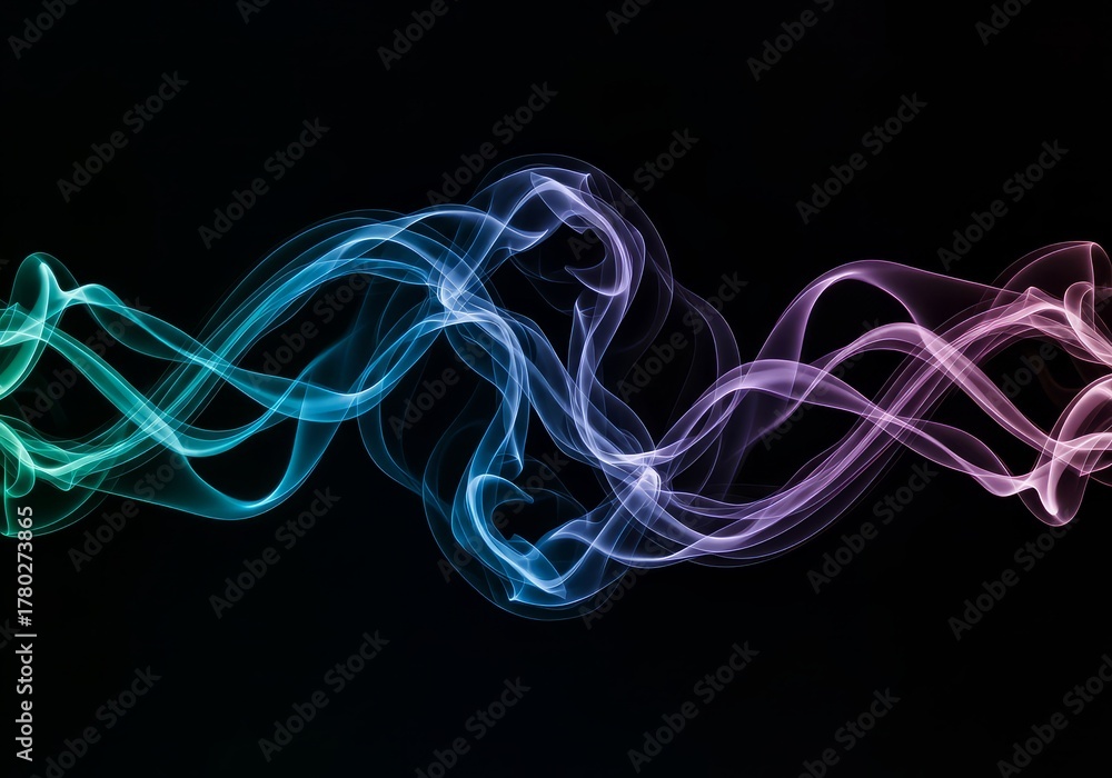 Naklejka premium Abstract smoke flowing with vibrant colors on a dark background creating a mesmerizing visual effect