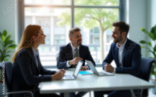 Wallpaper Mural Office Meeting Room with Businesspeople in a Blurred Background, Emphasizing a Professional Atmosphere and the Dynamics of Corporate Collaboration and Discussion. High quality Torontodigital.ca