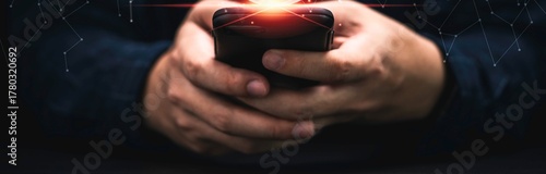 Foto Man aims a handgun directly at the viewer with a red muzzle flash