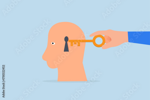 Unlock true potential, entrepreneur hand placing golden key to unleash potential within the human mind.
