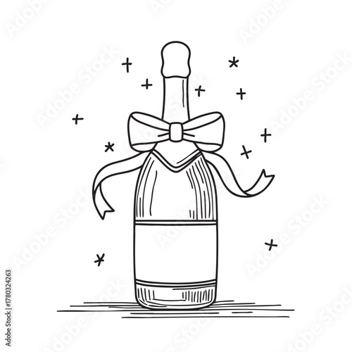 New Year champagne bottle decorated with a festive ribbon around the neck