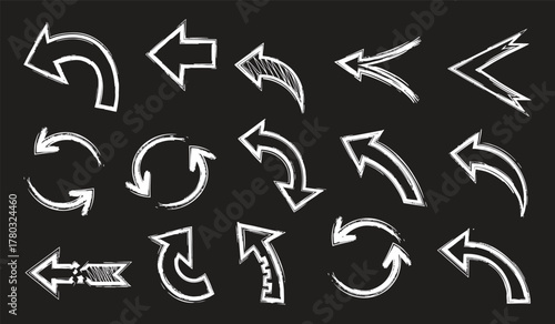 Set of black hand drawn grunge doodle spiral and curved charcoal, chalk arrows on white background. Scribble symbols of direction pointers, swirl arrow elements