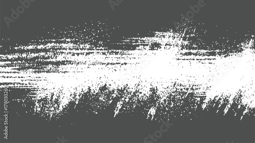 Textured grunge background with white distressed brush strokes on dark gray abstract black