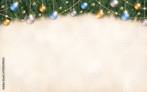 キラキラ光り輝くクリスマスの飾りと、ベージュ色の横長のぼかし背景