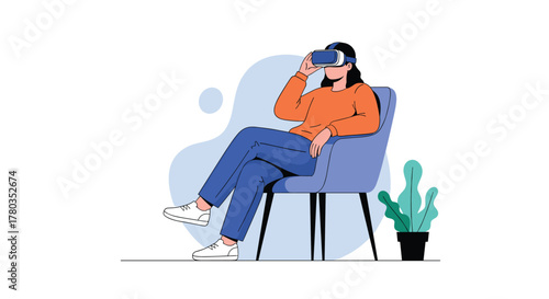 Woman in an orange sweater experiences a virtual reality world while sitting comfortably in a blue armchair next to a potted plant.