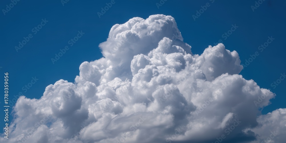 Naklejka premium Cumulonimbus Cloud Formation Against Blue Sky