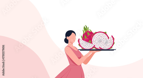Elegant Young Woman Presenting a Tray of Fresh Dragon Fruits for a Healthy Snack