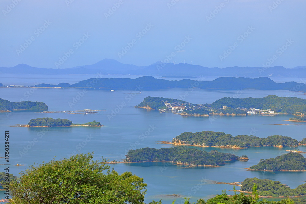 Fototapeta premium View from Ishidake Observatory deck, a lookout point with views of Kujukushima (Kujuku Islands in Funakoshicho, Sasebo, Nagasaki, Japan