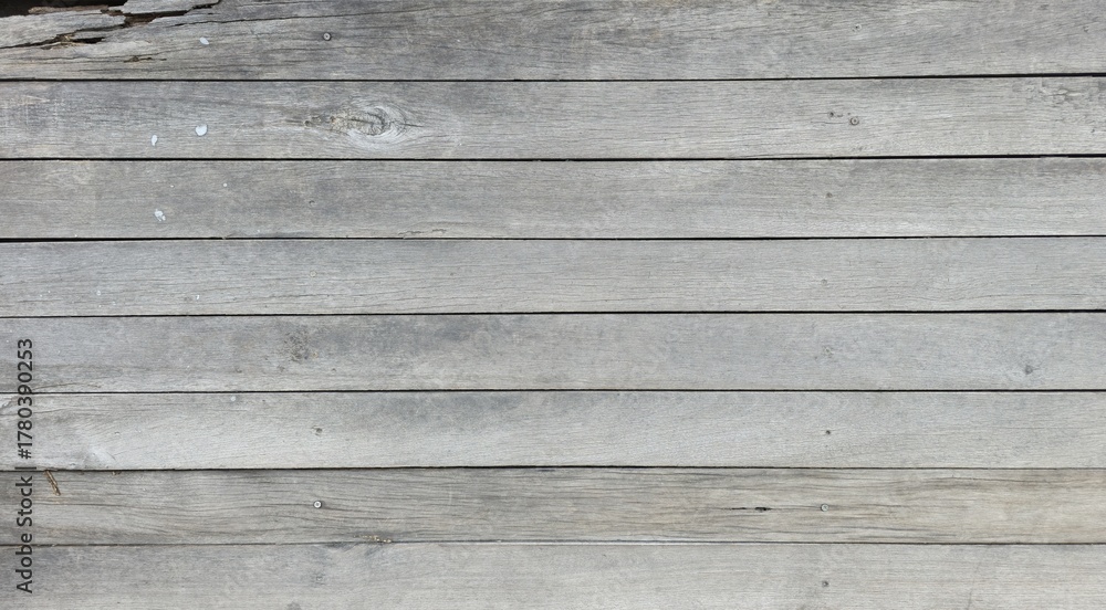 Obraz premium Old wood surface peeling and decaying over time, garden balcony floor, horizontal wooden planks, texture image. Weathered white painted wooden planks.