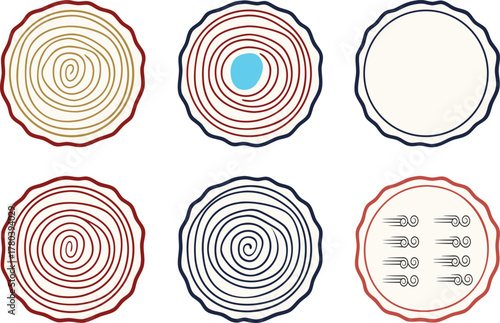 Collection of stylized tree rings and wood cross sections with decorative elements