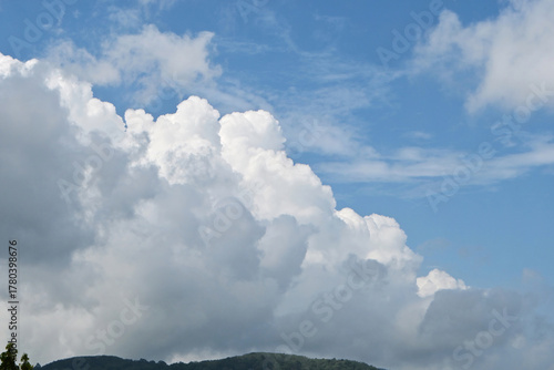 A beautiful cloudy vast sky summer landscape at the beach in Phuket, Thailand.