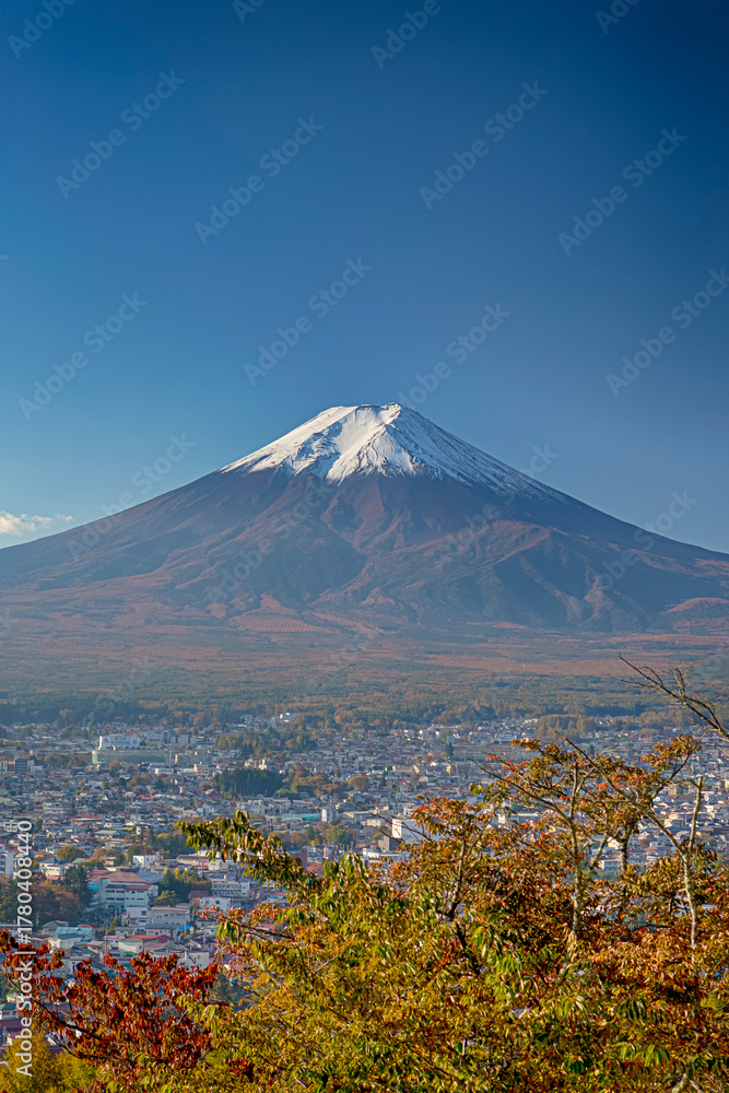 Fototapeta premium Japanese Destinations. Picturesque Fuji Mountain with Kyoto City With Houses in Foregound in Japan.