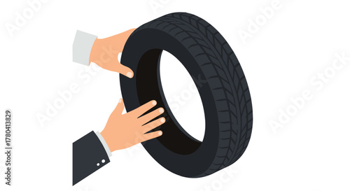 Hands holding car tire on white background automotive maintenance concept