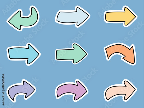 Colorful arrow stickers on a blue background for creative designs.