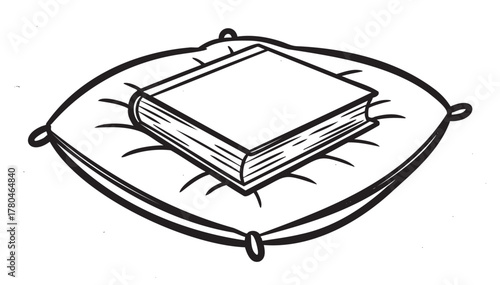 Black outline drawing of a book resting on a tufted cushion with corner ties, illustrating comfort and relaxation.