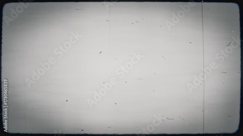 4K film grain and vignette background or multiply film cinema leader effect to be used over footage to make it look old. 