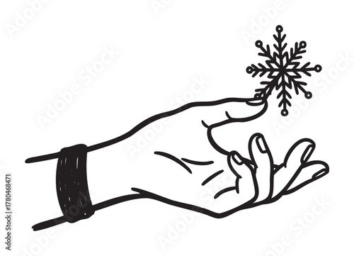 Black and white illustration of a hand delicately holding a single snowflake, emphasizing winter and fragility.