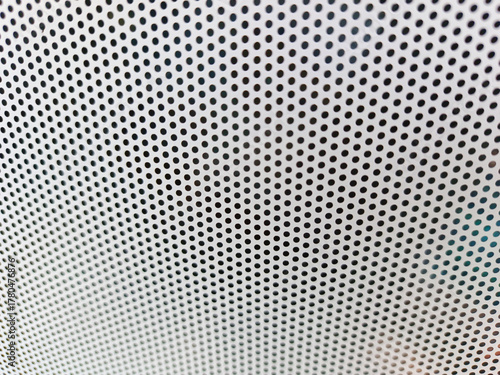 Close-up view at One Way Vision sticker film with dot pattern on glass. White concept design
